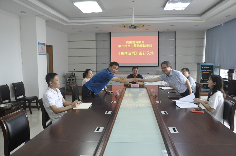 1592472304957290.jpg 握手照片_副本.jpg